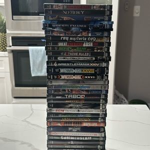 WWE DVD MOVIE LOT PICK AND CHOOSE. BUY 3 AND GET A RANDOM WWE MOVIE FOR FREE